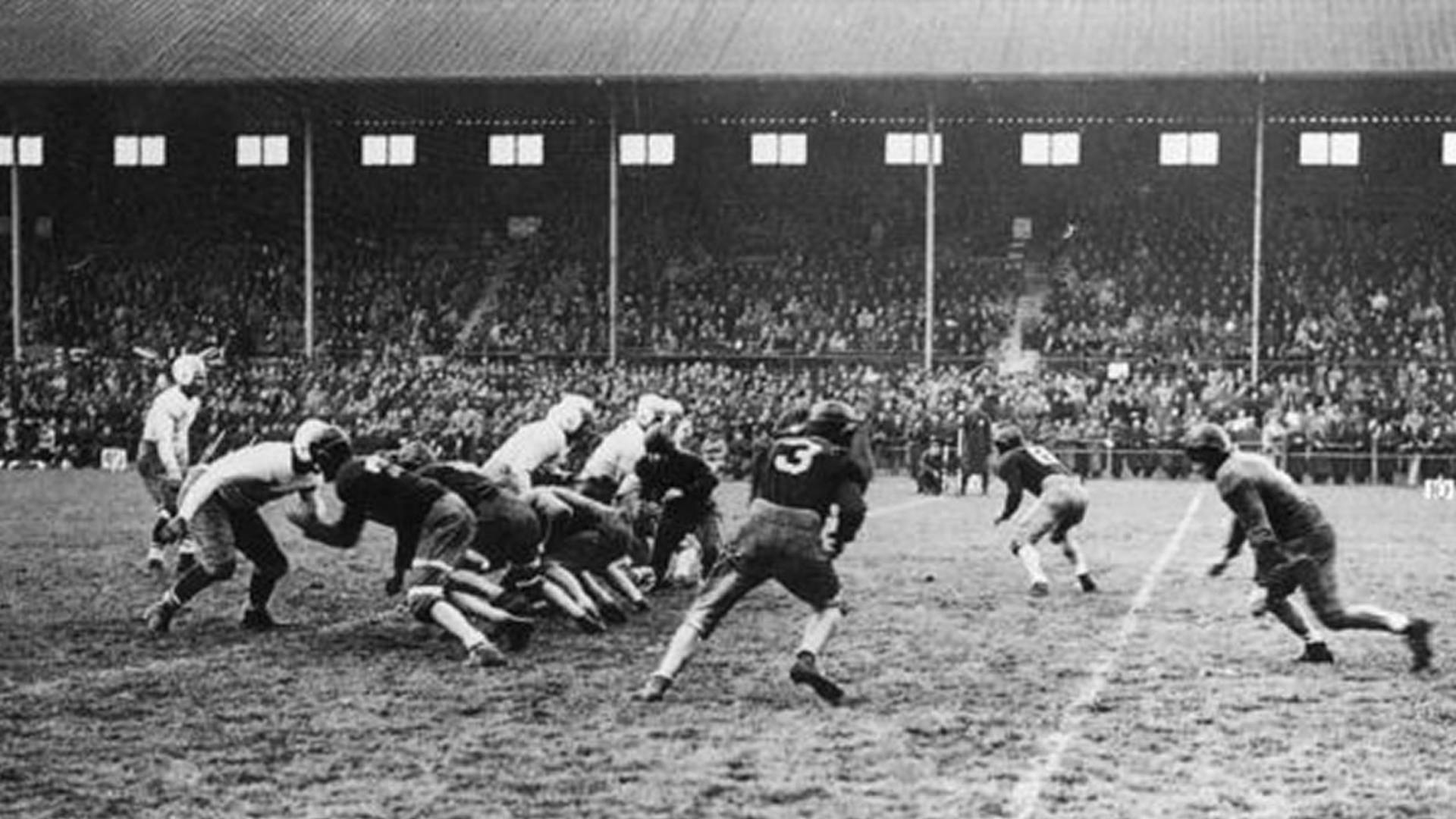 United States military teams 'Yarvard' and 'Hale' compete in the first game of American Football played in the European Theater of Operations during the Second World War. 'Hale' won the encounter 9-7 at Ravenhill Stadium, Belfast on 14th November 1942.