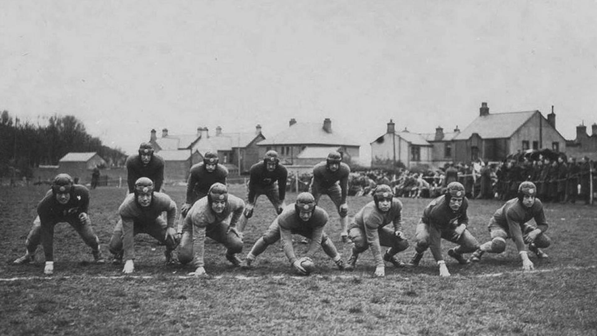 A United States military team named 'Yarvard' prepares for the first game of American Football played in the European Theater of Operations during the Second World War. 'Yarvard' trained at Sandy Bay playing fields in Larne, Co. Antrim in 1942.