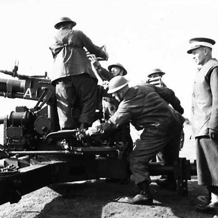 Gunners preparing to fire a Bofors Gun. This exercise at 17th Anti-Aircraft Practise Camp, Ballykinlar, Co. Down involved the firing of Bofors Guns at a 'kite' towed behind a military plane.