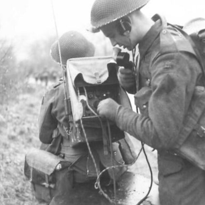Members of 8th Battalion, Sherwood Foresters, 148th Independent Infantry Brigade with a portable wireless radio during a 20-mile march as part of Exercise Dragoon using live ammunition in the Sperrin Mountains near Draperstown, Co. Londonderry.