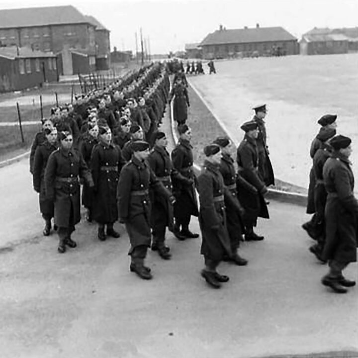 The Battalion march from the parade ground following the ceremony. The event is the presentation of the St. Patrick's Day Shamrock to members of a Battalion of the Royal Irish Fusiliers at Ballykinler, Co. Down.