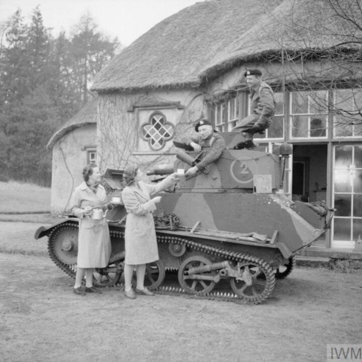 Mark VI Light Tank crew enjoying a well-earned cup of tea before a training exercise. A and B Squadron, 2nd Battalion, Fife and Forfar Yeomanry, Royal Armoured Corps attached to 53rd (Welsh) Infantry Division training at Derrymore House, Bessbrook, Co. Armagh.