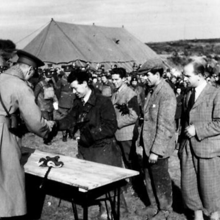 Major General B.T. Wilson C.B., D.S.O. present prizes to the winners. British Army motorcycle trials held at the old lead mines at Whitespots near Conlig, Co. Down.
