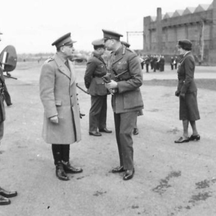 Lieutenant General Sir Henry Royds Pownall K.B.E., C.B., D.S.O., M.C. (General Officer Commanding British Troops in Northern Ireland) chats with His Royal Highness The Duke of Gloucester on his arrival at R.A.F. Aldergrove, Co. Antrim.