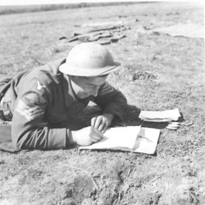 Sergeant Gallagher of Brandywell Avenue, Dery~Londonderry writes a letter home. 2nd Battalion, Royal Inniskilling Fusiliers celebrate St. Patrick's Day during their time in the fighting line at Anzio, Italy.