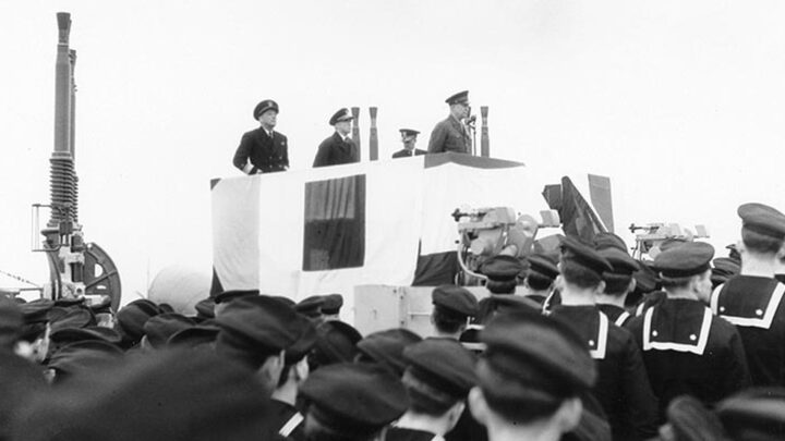 U.S. National Archives Photo: 80-G-352914. General Dwight D. Eisenhower (U.S. Army) addresses the crew of U.S.S. Texas (BB-35) in May 1944. Also on the platform is Rear Admiral Alan G. Kirk, Commander Task Force 122.