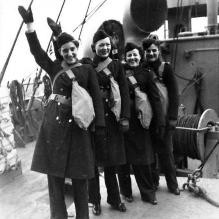 American nurses wearing trousers as part of their 'voyage uniform' arrive as the third and largest contingent of United States Army soldiers arrived at Dufferin Dock, Belfast.