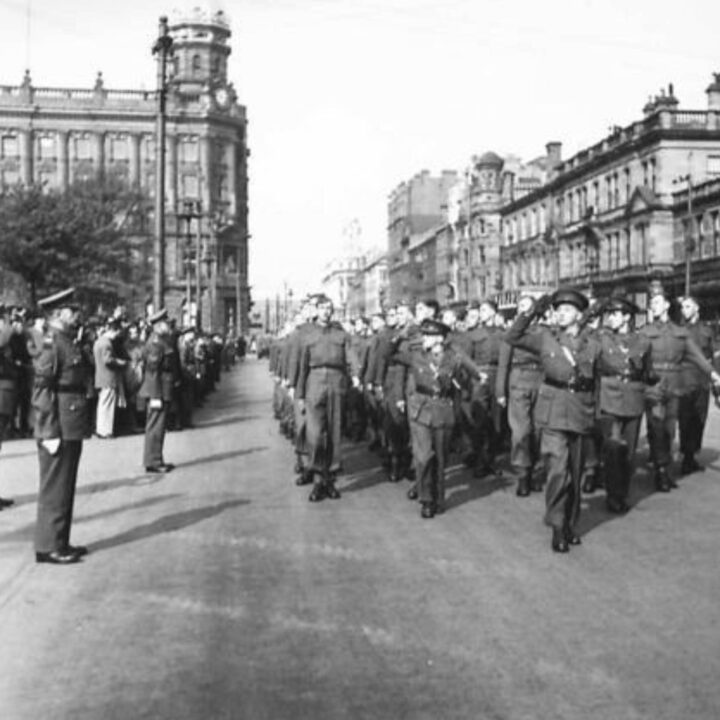 Major General Vivian Henry Bruce Majendie (General Officer Commanding Northern Ireland District) takes the salute from a members of The Royal Berkshire Regiment at Belfast City Hall, Donegall Square North, Belfast.