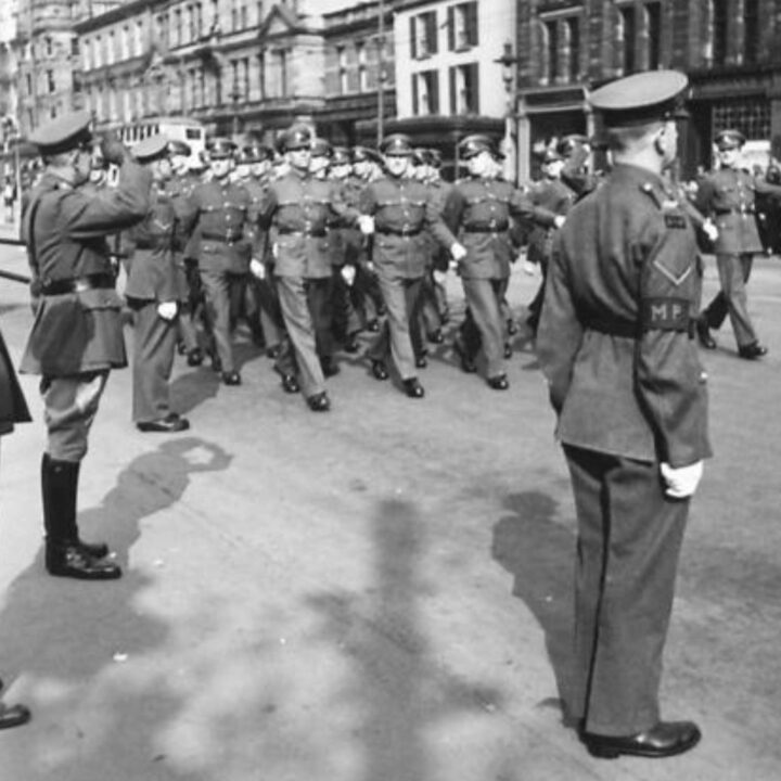 Major General Vivian Henry Bruce Majendie (General Officer Commanding Northern Ireland District) takes the salute from a members of The Corps of Military Police at Belfast City Hall, Donegall Square North, Belfast.