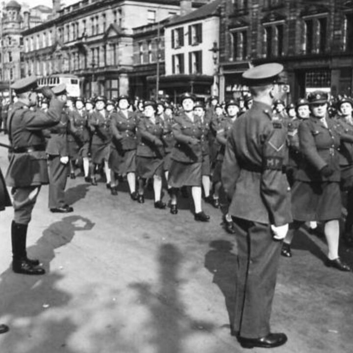Major General Vivian Henry Bruce Majendie (General Officer Commanding Northern Ireland District) takes the salute from a members of The Auxiliary Territorial Service at Belfast City Hall, Donegall Square North, Belfast.
