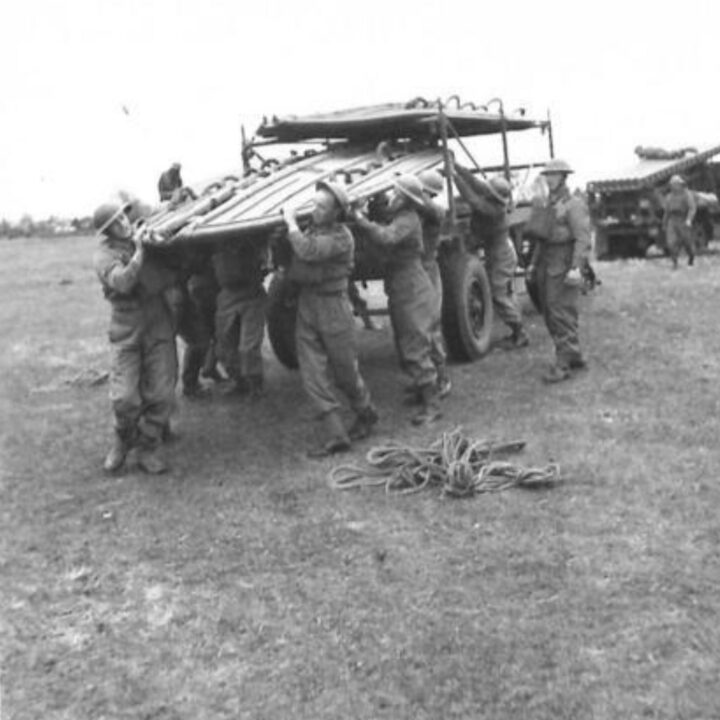 Sappers unloading folding boat equipment during a demonstration by 61st Divisional Engineers at Agivey, Co. Londonderry.