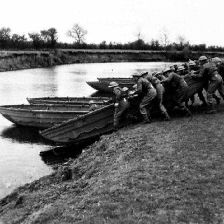 Sappers launching boats during a demonstration by 61st Divisional Engineers at Agivey, Co. Londonderry.