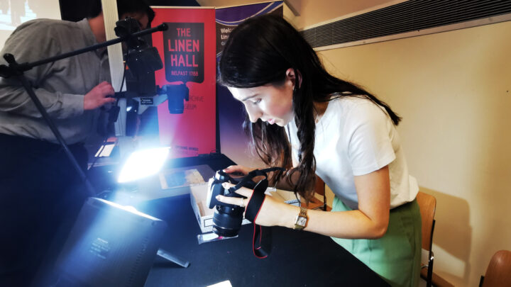 Sara Cathcart of The Linen Hall, Belfast at work digitising artefacts during the Their Finest Hour digital collection day - the first of its kind in Northern Ireland.