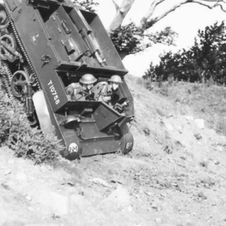 Soldiers of 8th (Nottinghamshire) Battalion, The Sherwood Foresters, 148th Independent Infantry Brigade in a Universal Carrier make an almost vertical drop during a training exercise near Muckamore, Co. Antrim.