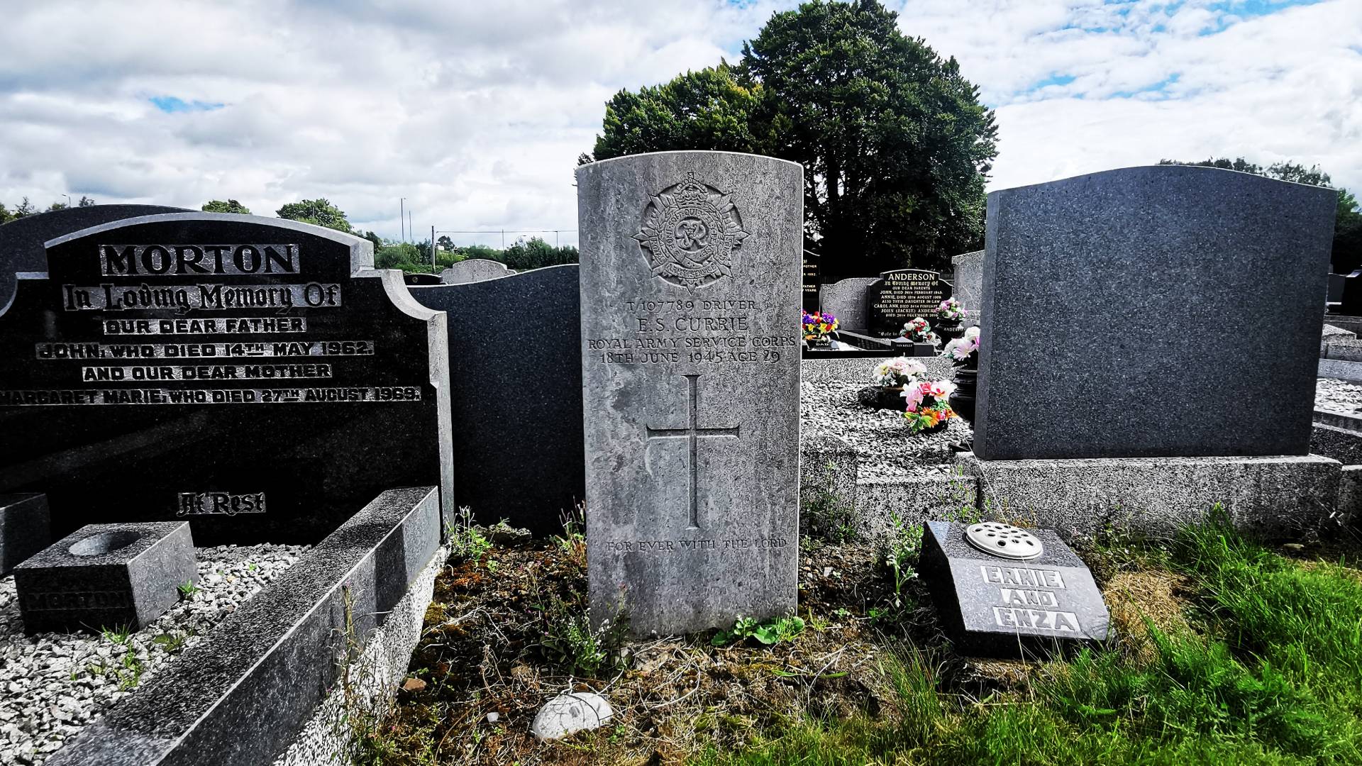 A Commonwealth War Graves headstone marks the grave of Driver Ernest Stewart Currie in Seagoe Cemetery, Portadown, Co. Armagh.