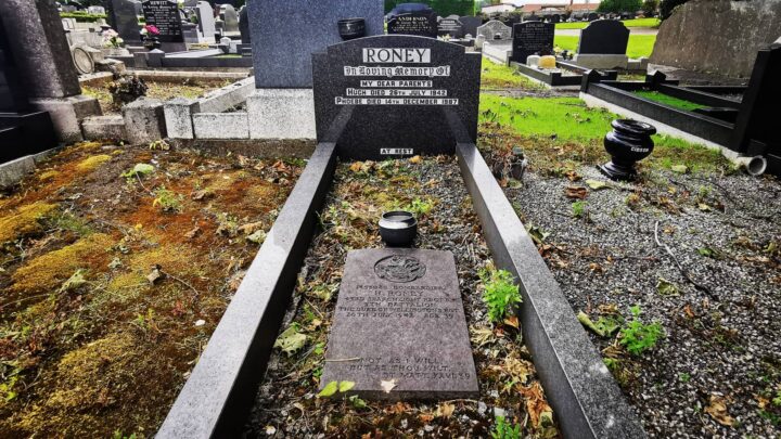 A Commonwealth War Graves headstone marks the grave of Bombardier Hugh Roney in Seagoe (St. Gobhan's) Church of Ireland Churchyard, Portadown, Co. Armagh.