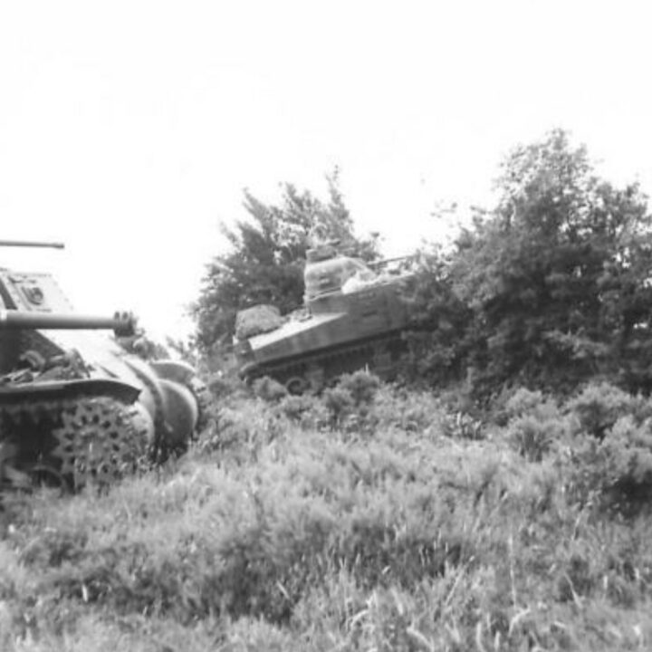 A number of M3 Lee Medium Tanks of a United States Army Armored Division cross hedgerows and obstacles as part of Exercise Defiance near Carrickfergus, Co. Antrim.