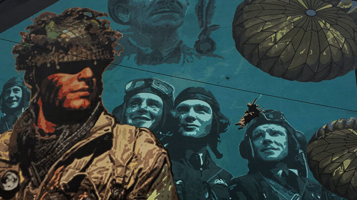 General Stanislaw Sosabowski of Polish 1st Independent Parachute Brigade, fighter pilots of R.A.F. 303 Squadron and an airborne soldier in contemporary battledress are depicted on a mural created by Dee Craig and Ballymac Friendship Centre on the corner of Foxglove Street and Beersbridge Road, Belfast.