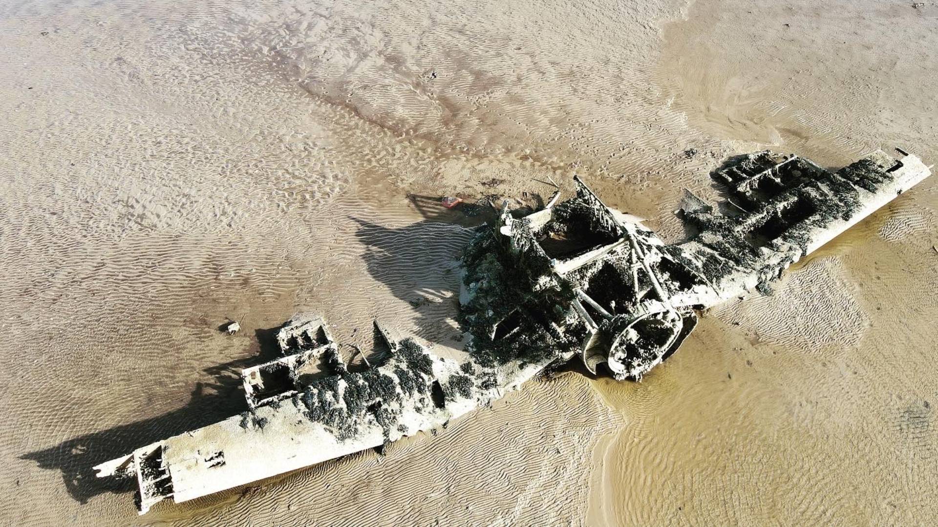 Wreckage of Vought F4U-1 Corsair R JT693 on the mudflats in Lough Foyle off the coast at Ballykelly, Co. Londonderry.