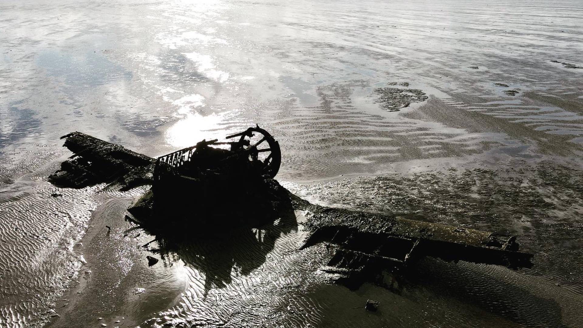 Wreckage of Vought F4U-1 Corsair R JT693 on the mudflats in Lough Foyle off the coast at Ballykelly, Co. Londonderry.