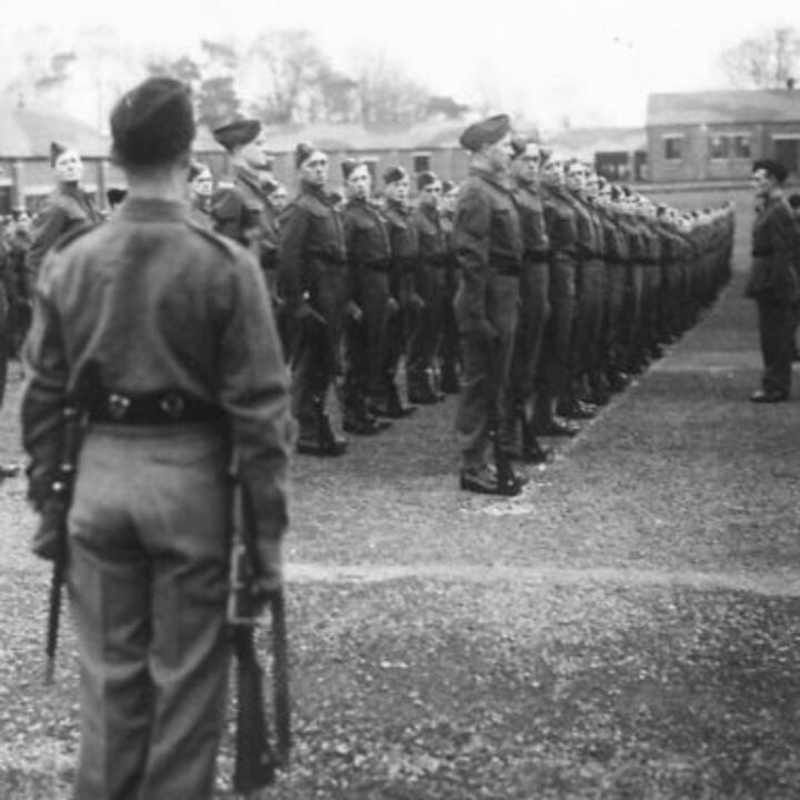 New recruits to the Royal Ulster Rifles with less than three months of training drilling on the barrack square at St. Patrick's Barracks, Ballymena, Co. Antrim. The photo is part of a series from the visit of 'Sortie Y' to Northern Command.