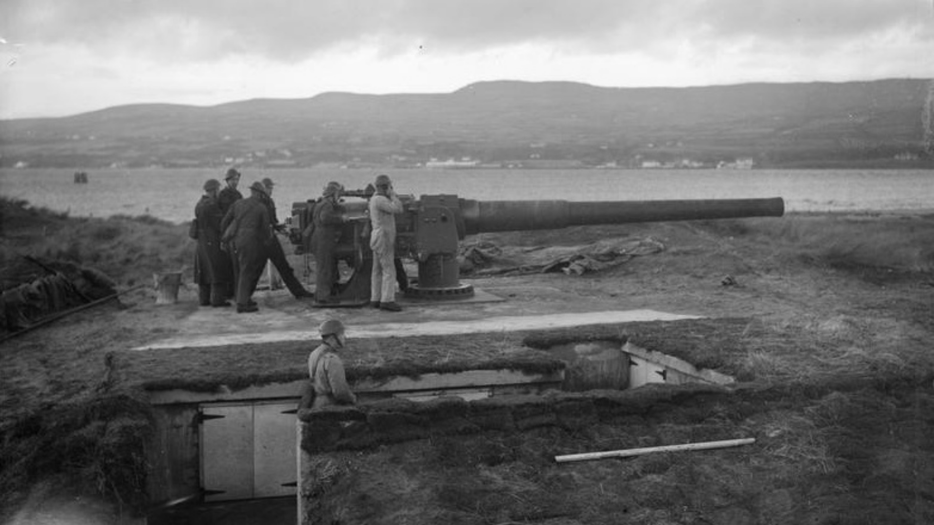 A 6-inch naval coastal defence gun at defences under control of 380th Battery, Royal Artillery (T.A.) at Magilligan Point, Co. Londonderry. The photo is part of a series from the visit of 'Sortie Y' to Northern Command.
