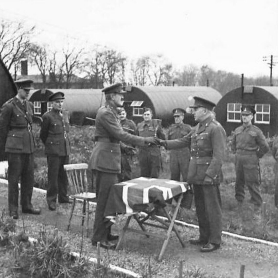 Brigadier George Stephen Brunskill C.B.E., M.C. presenting the Mitchell Hill Cup for the best soldiers' vegetable garden in Northern Ireland to Major F.H. Sheppard M.C.