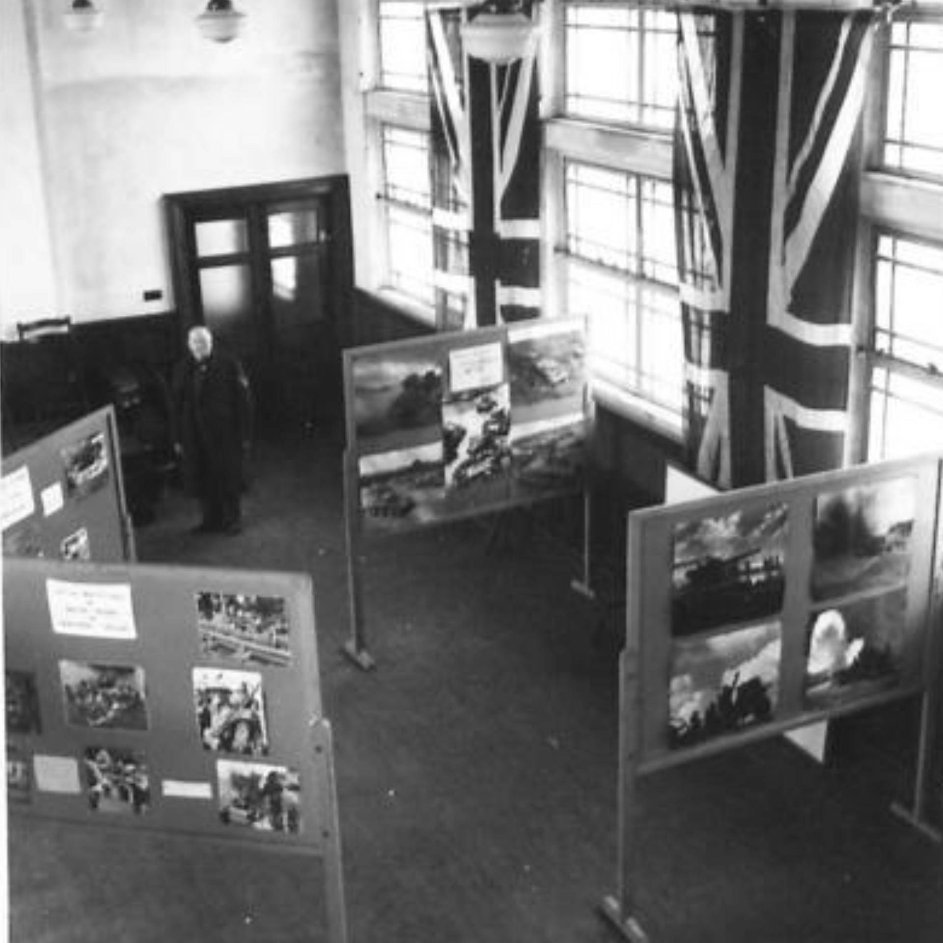 An exhibition of War Office photographs somewhere in Northern Ireland.