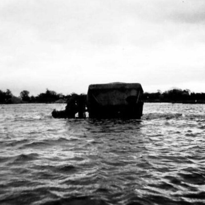 British Army lorry drivers travel through the depths taking their vehicles into the water to test waterproofing.