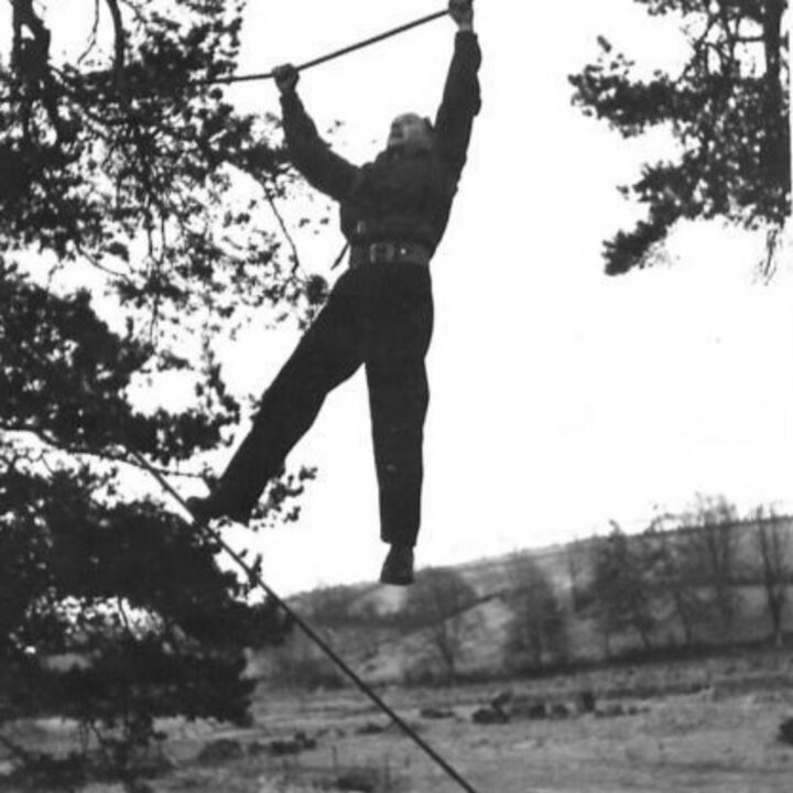 A soldier of 2/5th Battalion, Lancashire Fusiliers climbs across a rope during training near Keady, Co. Armagh.