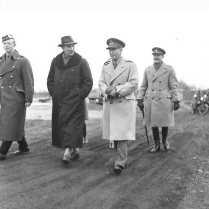 The Right Honourable Sir Basil Brooke (Prime Minister of Northern Ireland) and Lieutenant General Sir Alan Gordon Cunningham K.C.B., D.S.O., M.C. (General Officer Commanding Northern Ireland) arrive at Lady's Bay, Lough Neagh to observe American vehicles carrying out waterproofing testing.