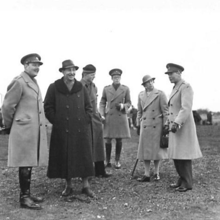 The Right Honourable Sir Basil Brooke (Prime Minister of Northern Ireland), Lady Brooke, Lieutenant General Sir Alan Gordon Cunningham K.C.B., D.S.O., M.C. (General Officer Commanding Northern Ireland), and Lieutenant Colonel W.C. Forde are among the dignitaries at Lady's Bay, Lough Neagh to observe American vehicles carrying out waterproofing testing.
