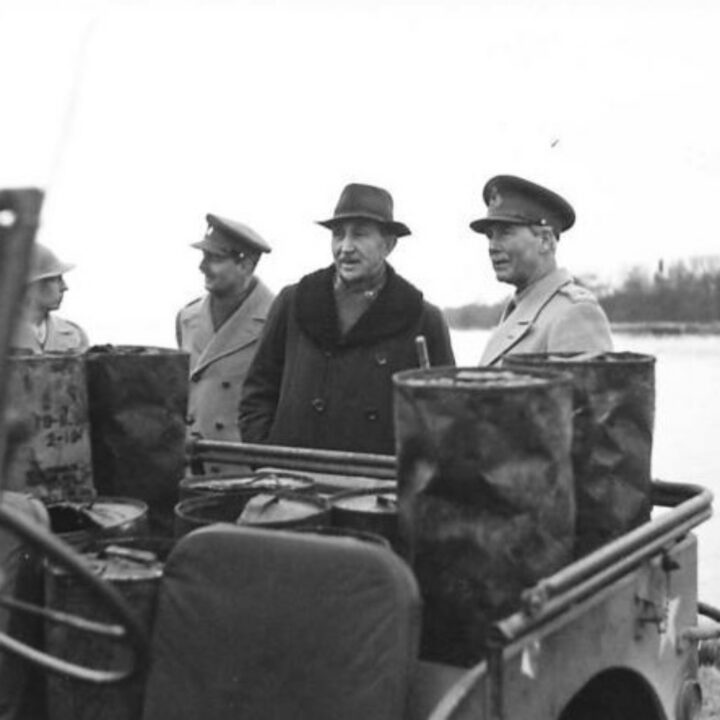 The Right Honourable Sir Basil Brooke (Prime Minister of Northern Ireland) and Lieutenant General Sir Alan Gordon Cunningham K.C.B, D.S.O., M.C. at Lady's Bay, Lough Neagh while observing American vehicles carrying out waterproofing testing.