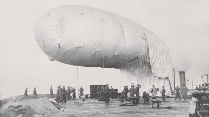 Members of No. 968 Barrage Balloon Squadron in Bangor, Co. Down working on a waterborne barrage balloon vessel on Belfast Lough.