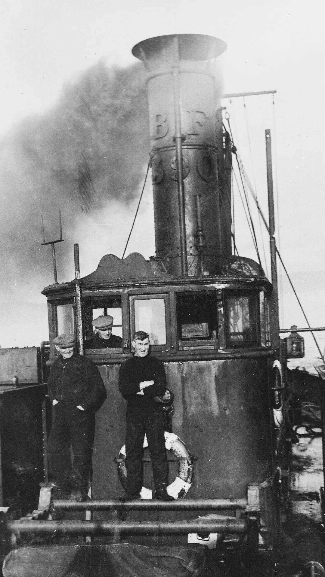 Crew members of 'Betsy Slater' in Bangor, Co. Down. The 'Betsy Slater' was requisitioned as a barrage balloon vessel on Belfast Lough.