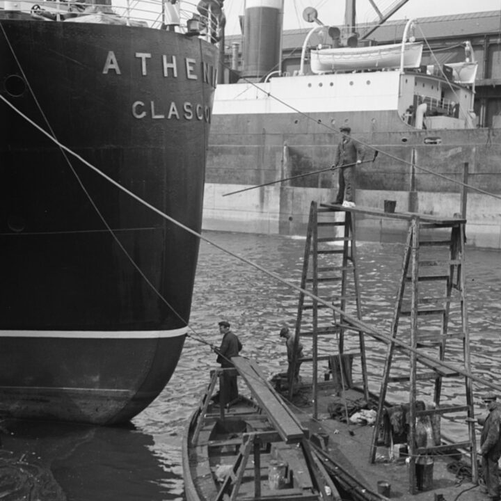 Painting the stern of S.S. Athenia in Glasgow, Lanarkshire, Scotland. Photo taken by Paul Vanderbilt during the summer of 1937.