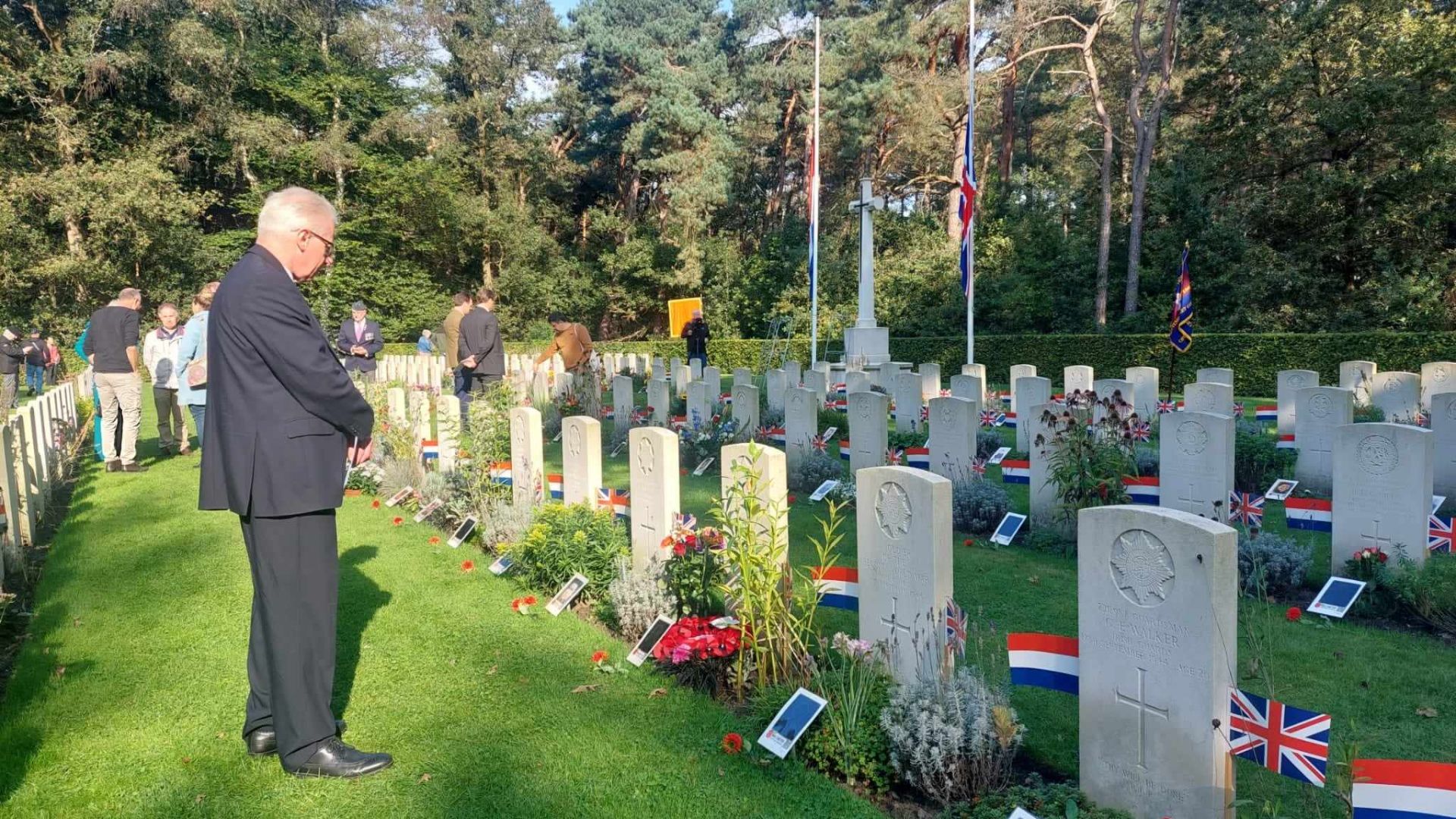 Bill Watson of Dunmurry, Co. Antrim pays respects to his relative Guardsman Thomas Crowe Watson, killed during Operation MARKET GARDEN on 17th September 1944.